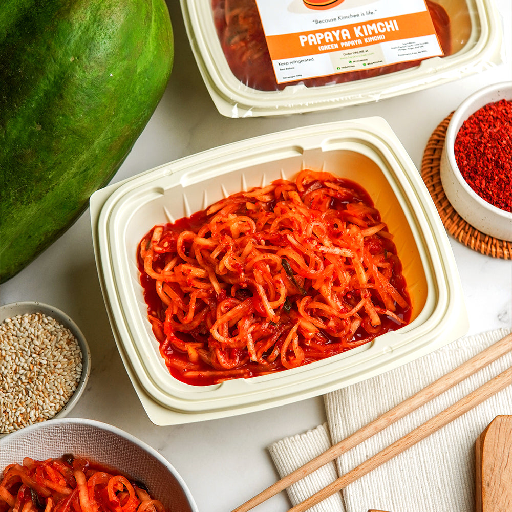 <strong>PAPAYA KIMCHEE</strong><br>[Green Papaya Kimchee]